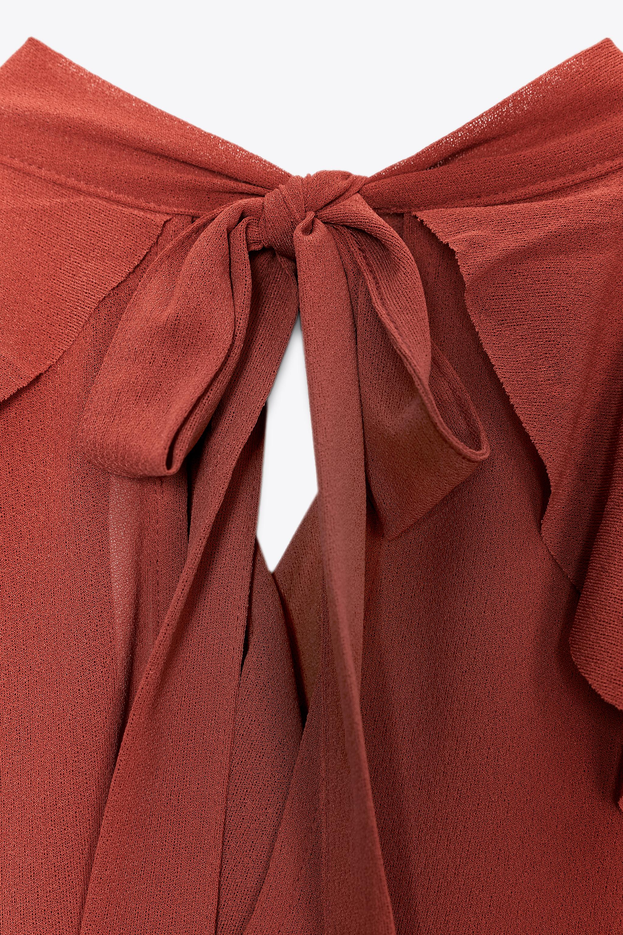 RUFFLED HALTER BLOUSE